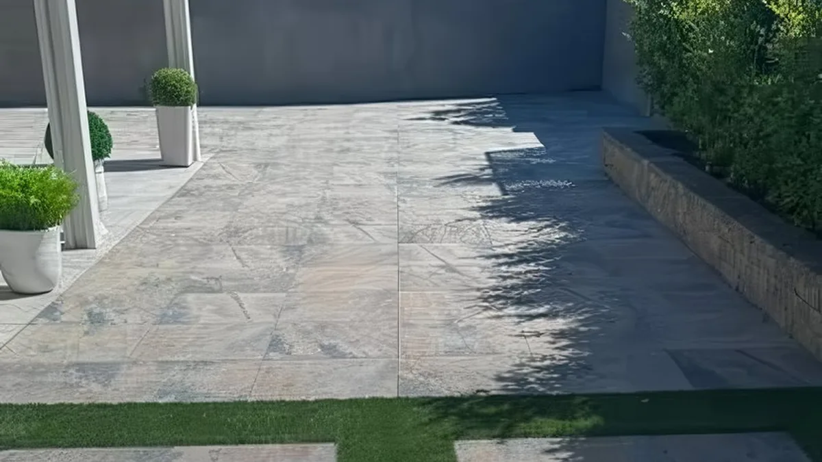 Compacted aggregate base under interlocking pavers during a Las Vegas install