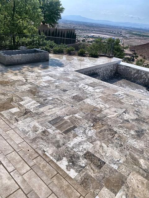 Travertine patio over the valley, a Unique Pavers job in Las Vegas Valley