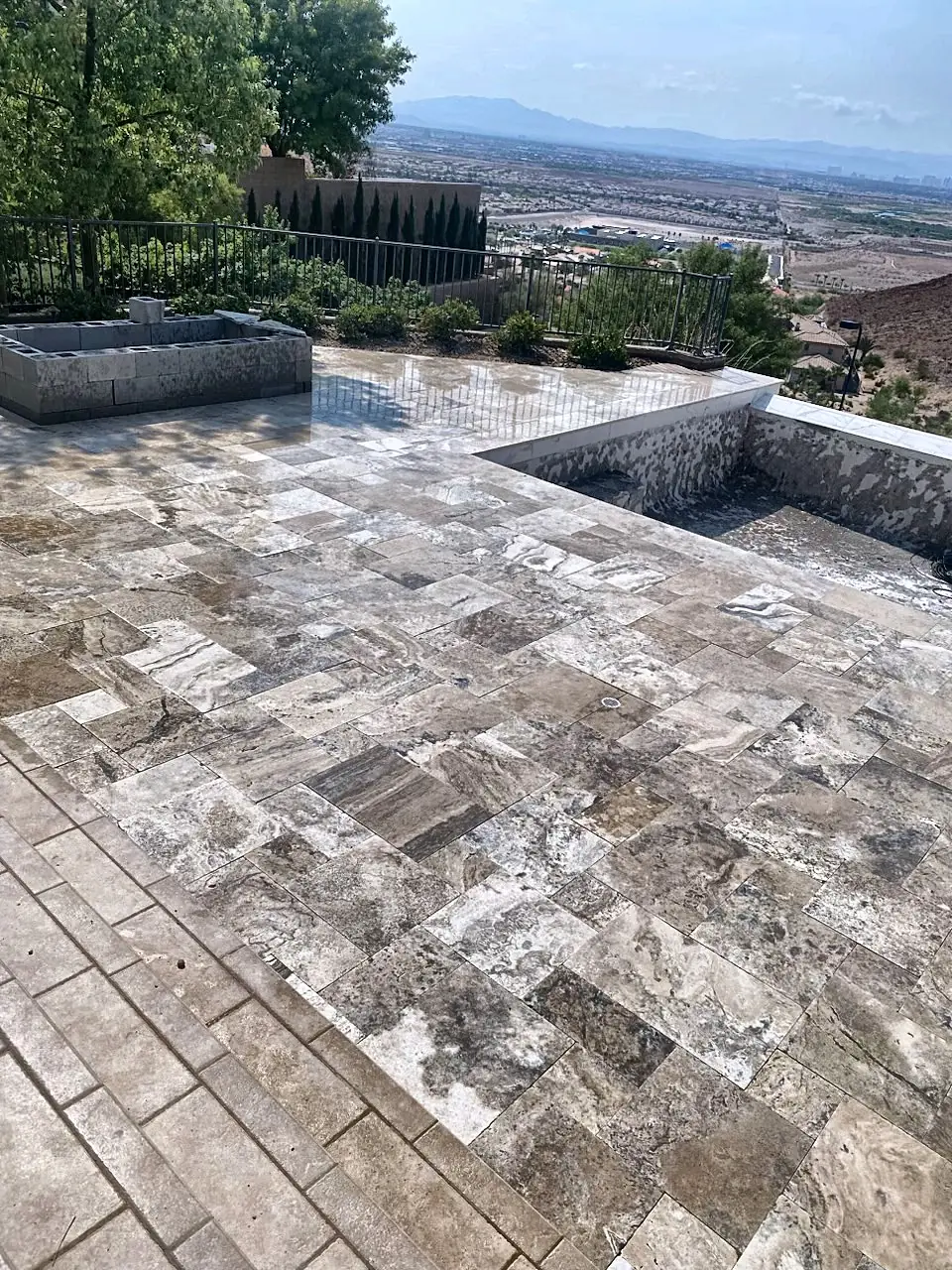 Travertine patio over the valley, a Unique Pavers job in the Las Vegas valley
