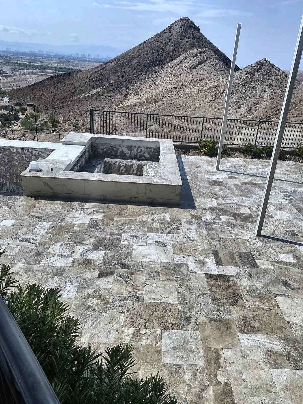 Travertine patio and fire pit, a Unique Pavers job in the Las Vegas valley