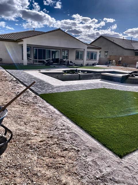 Turf lawn and paver patio, spa going in, a Unique Pavers job in Las Vegas Valley