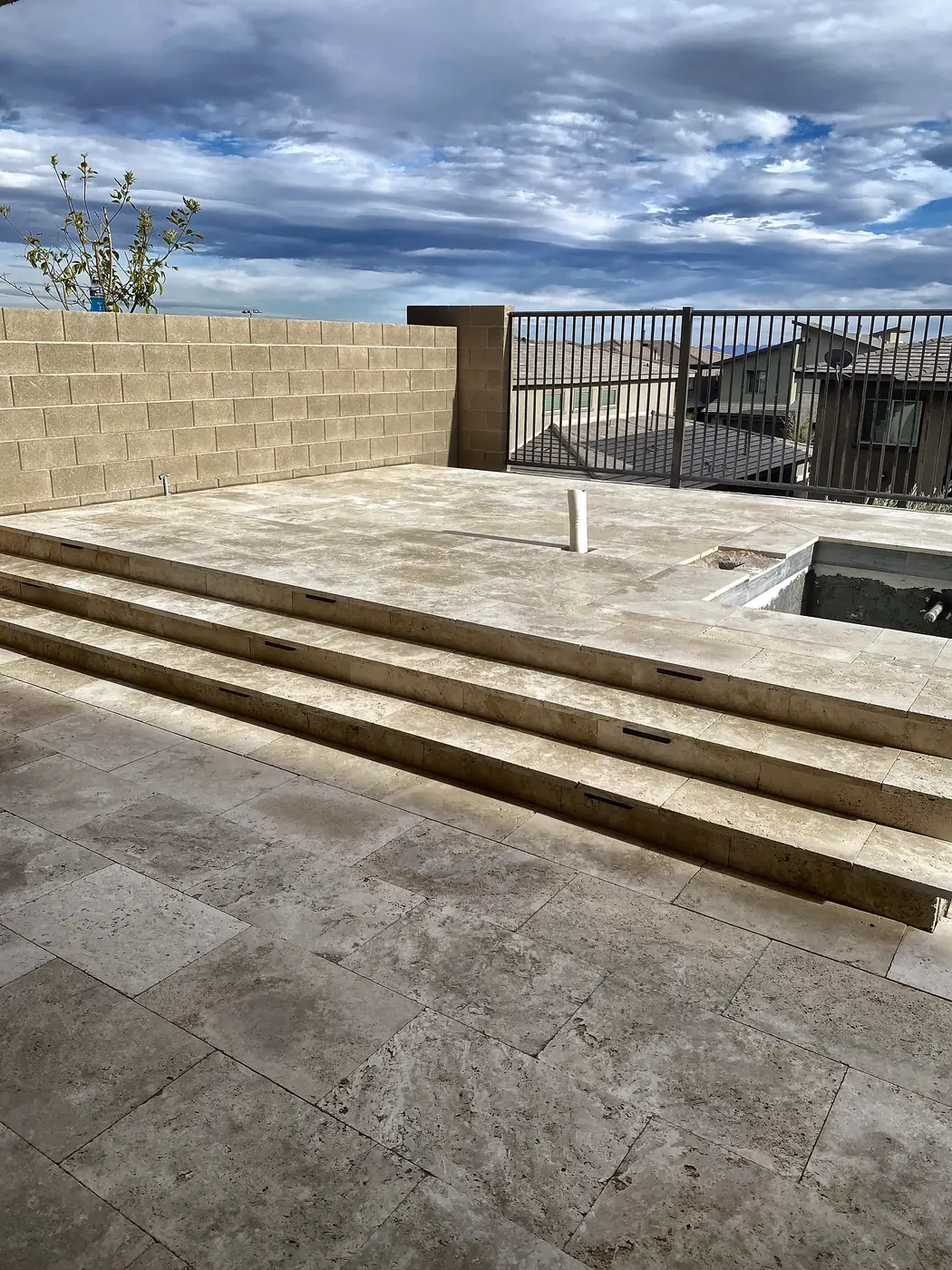Travertine terrace and steps, a Unique Pavers job in the Las Vegas valley