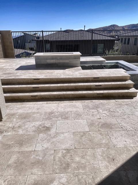Steps and fire pit, travertine, a Unique Pavers job in Las Vegas Valley
