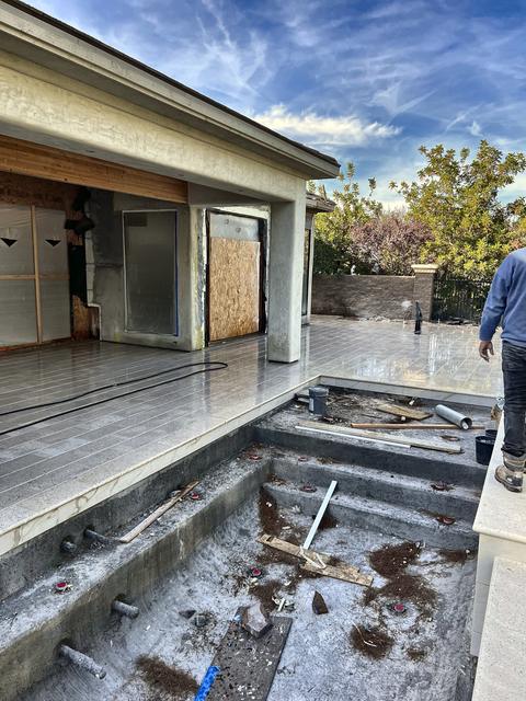 Steps forming under the patio cover, a Unique Pavers job in Las Vegas Valley