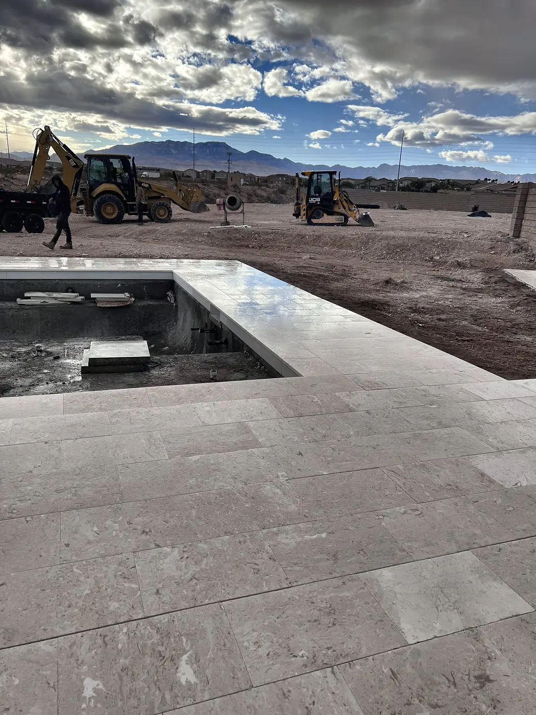 Travertine pool deck, mountain view, a Unique Pavers job in the Las Vegas valley