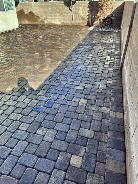 Cobble patio along the side yard, a Unique Pavers job in Las Vegas Valley