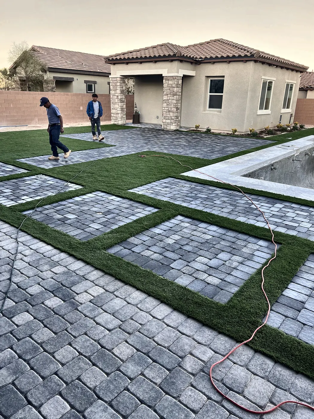 Paver squares and turf, front yard, a Unique Pavers job in the Las Vegas valley