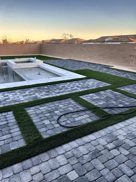 Turf borders around the pavers, a Unique Pavers job in Las Vegas Valley