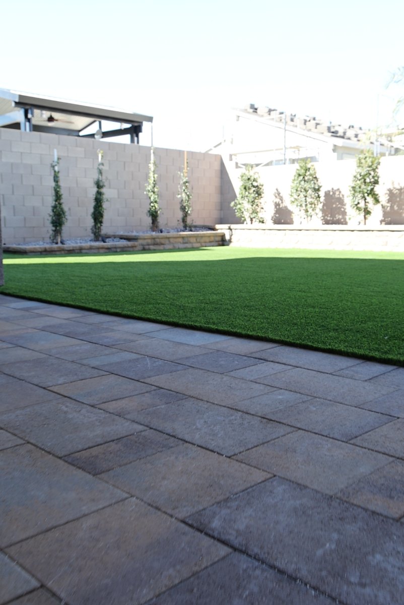 Paver patio and artificial turf backyard in Las Vegas, photo shared by a Unique Pavers customer on Google